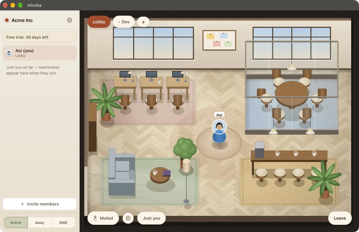The Hiroba office right after entering: an isometric office with desks, a glass meeting room, a lounge, and a café counter, and your avatar in the middle of the floor. The sidebar shows the organization name Acme Inc, Free trial: 30 days left, your name, and an Invite members button.