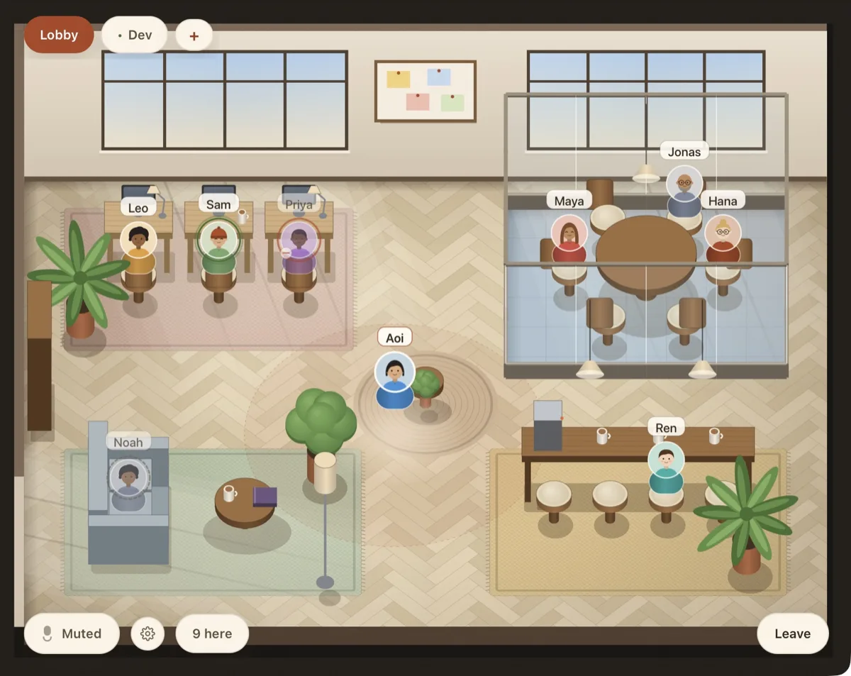 The Hiroba lobby: an isometric office with desks, a meeting room and a kitchen, and nine avatars spread across it